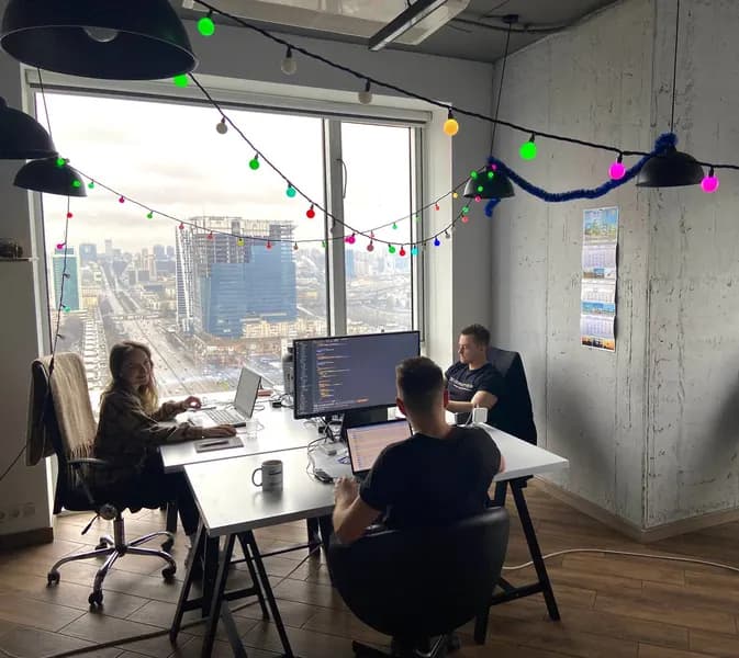 Engineers working in the DevBrother office